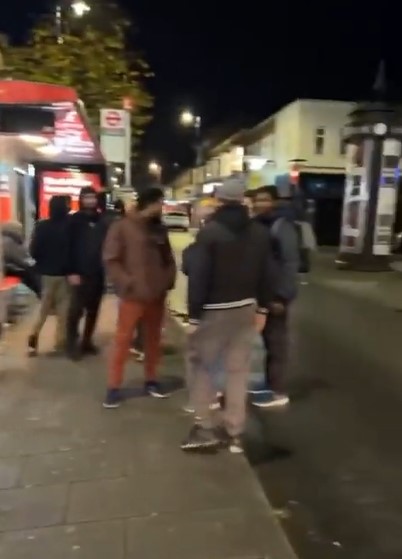 The masses could be seen gathering on the street near the ATM, too