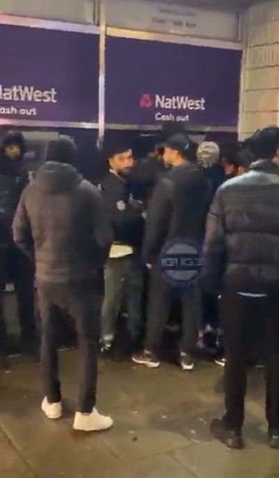 Crowds of people rushed to get their hands on some money from the East Ham machine