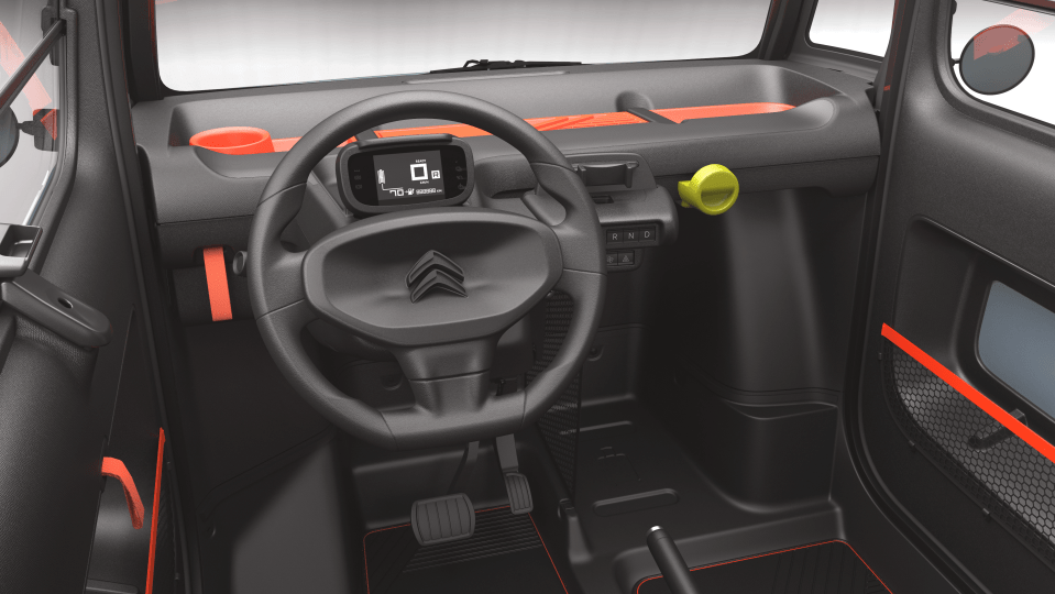 The Ami’s cute interior is designed to be compact and basic