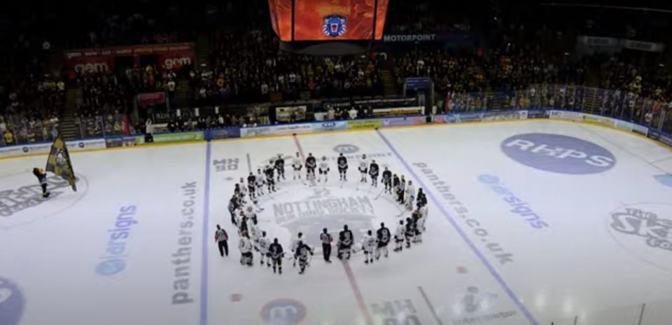 The two teams formed a circle to pay tribute