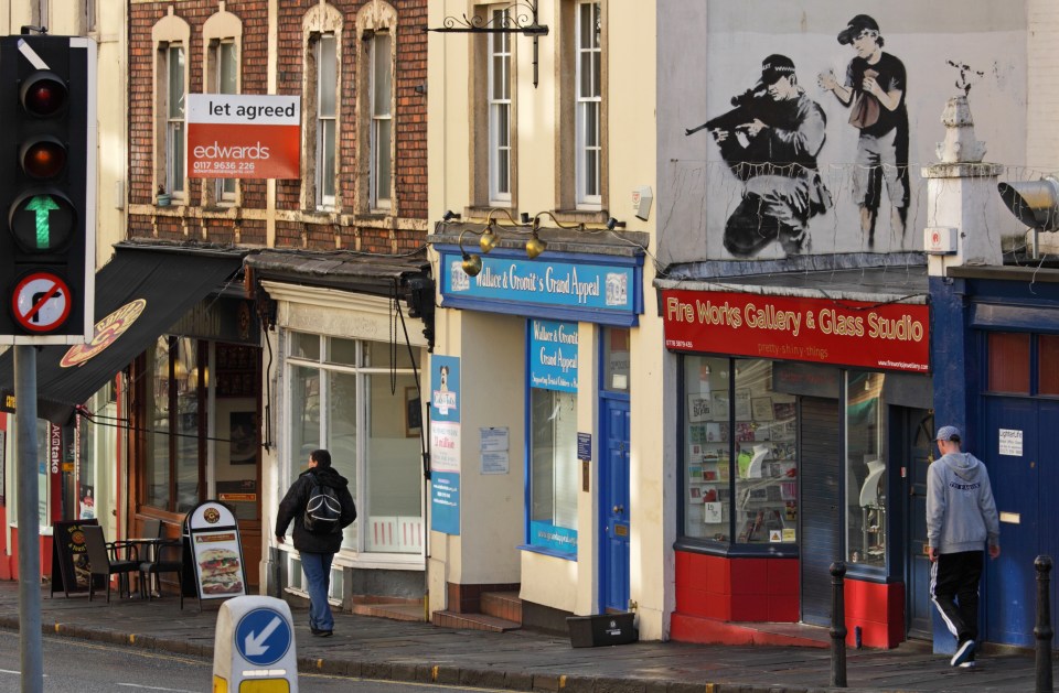 This image of a police sniper was painted by Banksy in his native Bristol in 2011