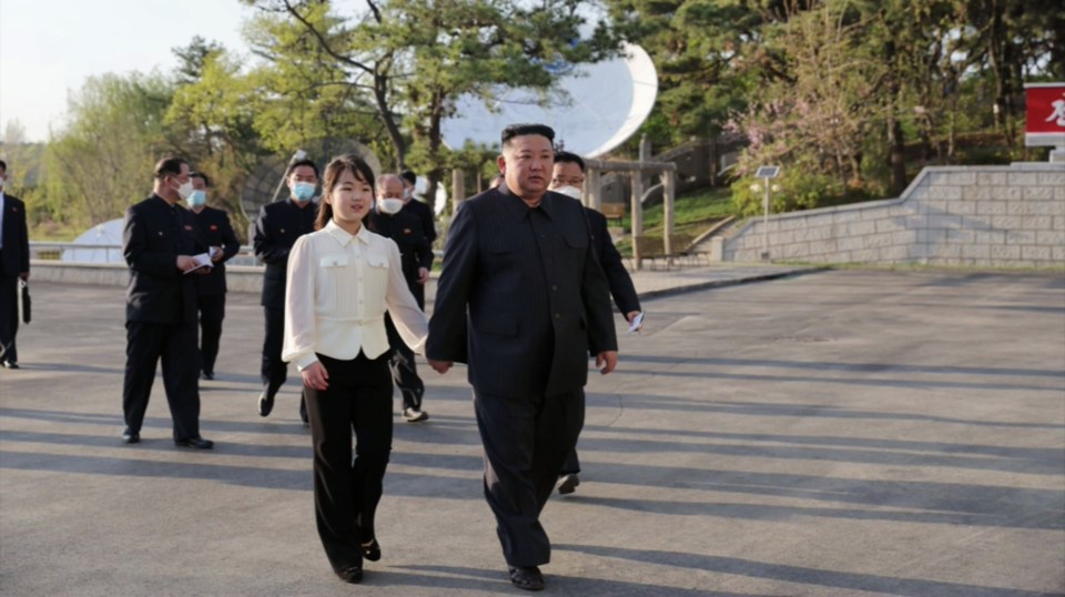 Paranoid Kim Jong Un is constantly flanked by armed security