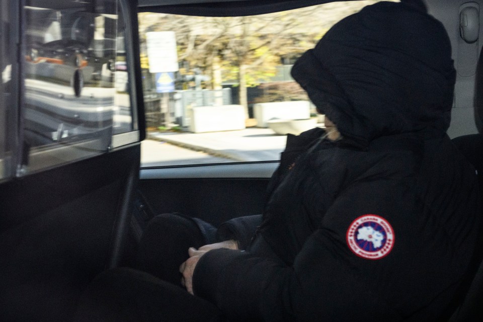 Peter Nygard leaves court in a police van after being found guilty of four counts of sexual assault