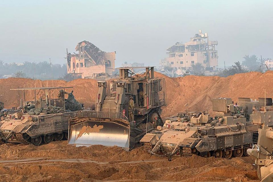 Israel tanks and a bulldozer inside the Gaza Strip as battles between the IDF and Hamas continue