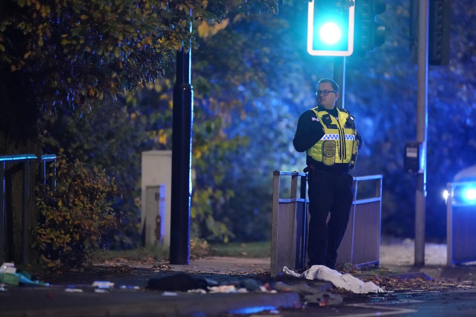 Police at the scene after a boy, 15, was seriously injured