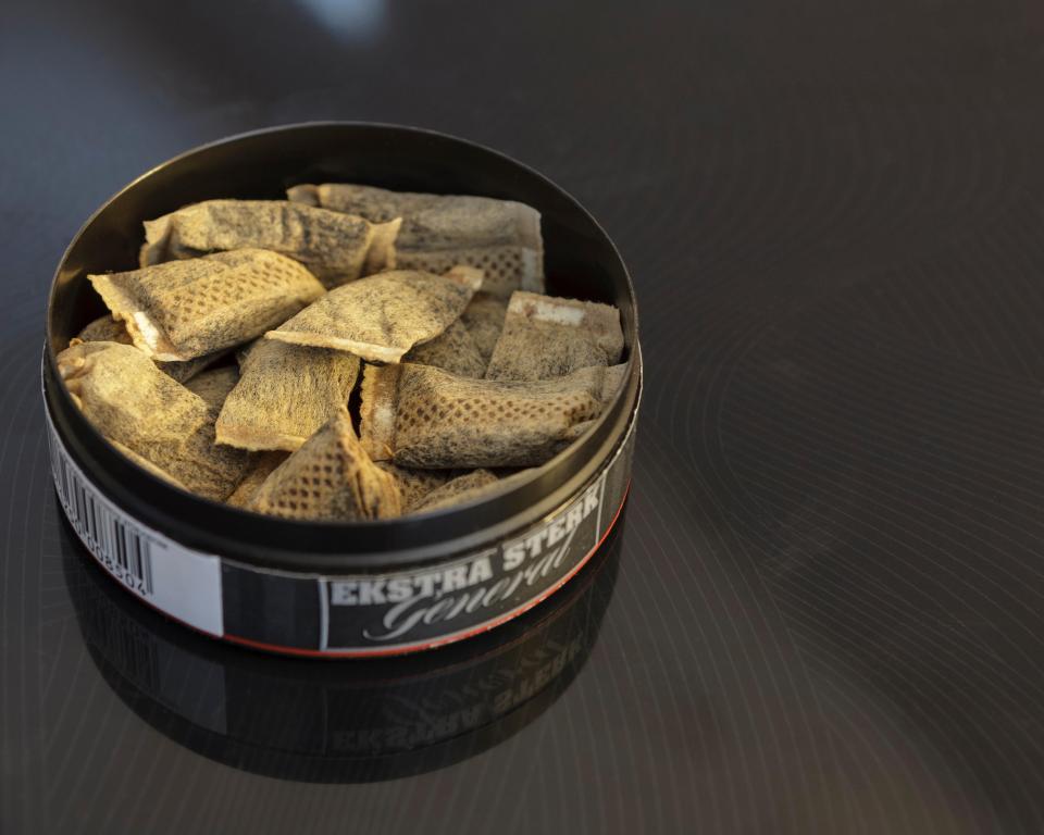 Snus is a tobacco product that comes in a pouch and is placed on the gum behind the top lip