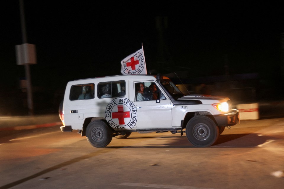 The Red Cross convoy at the Rafah border crossing between Gaza and Egypt included at least four vehicles with up to six people in the rear