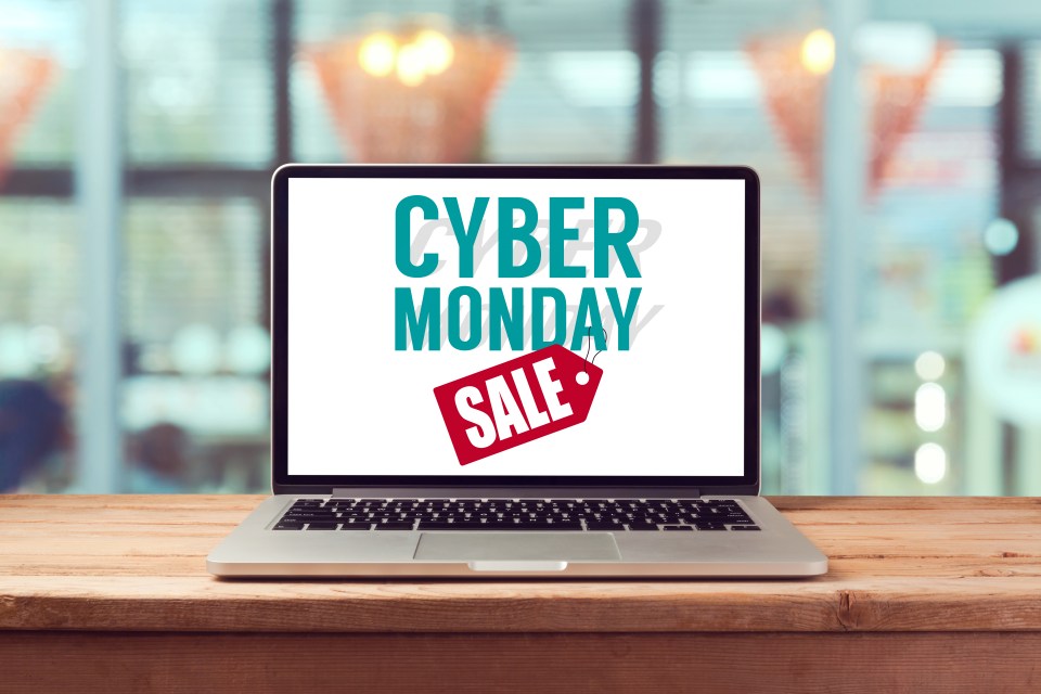 Cyber Monday sign on laptop computer. Holiday online shopping concept. View from above; Shutterstock ID 332590928; purchase_order: -; job: -; client: -; other: -