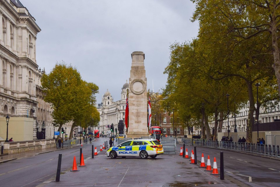 Police officers guard the Cenotaph war memorial in Whitehall ahead of Armistice Day