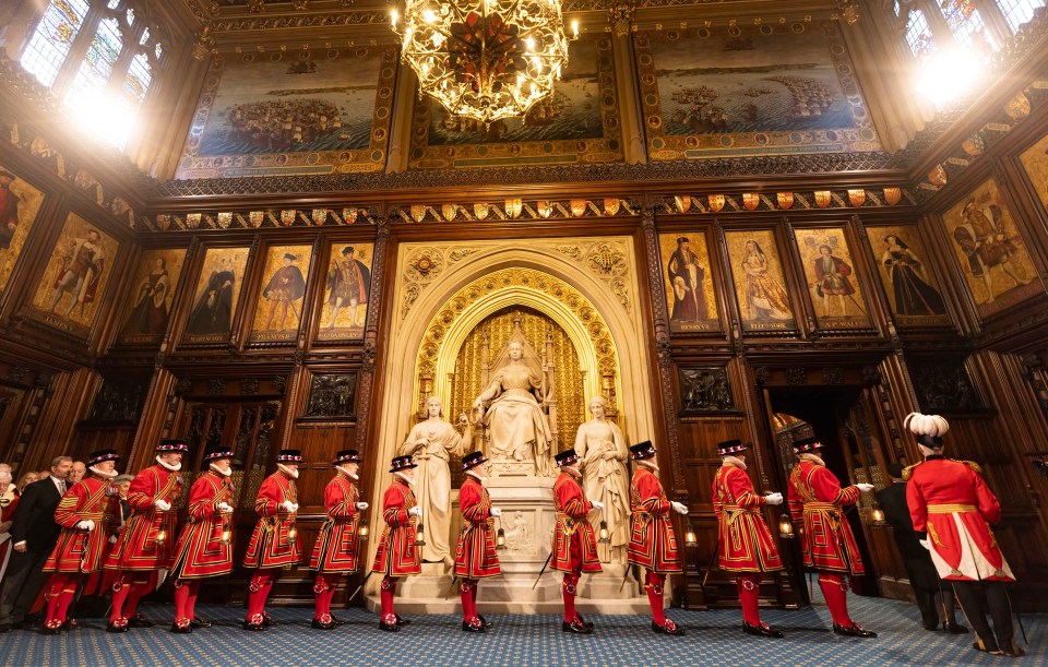 Yeoman warders take part in the ceremonial search inside the House of Lords, which is the traditional start to the State Opening of Parliament