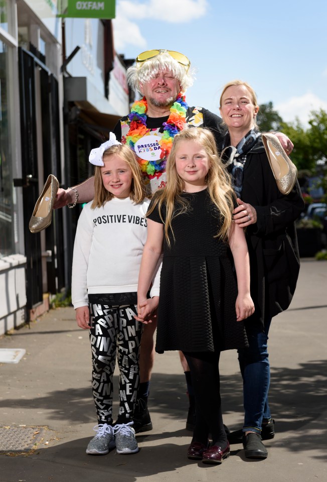 Shaun pictured with his wife Joanne and their two daughters