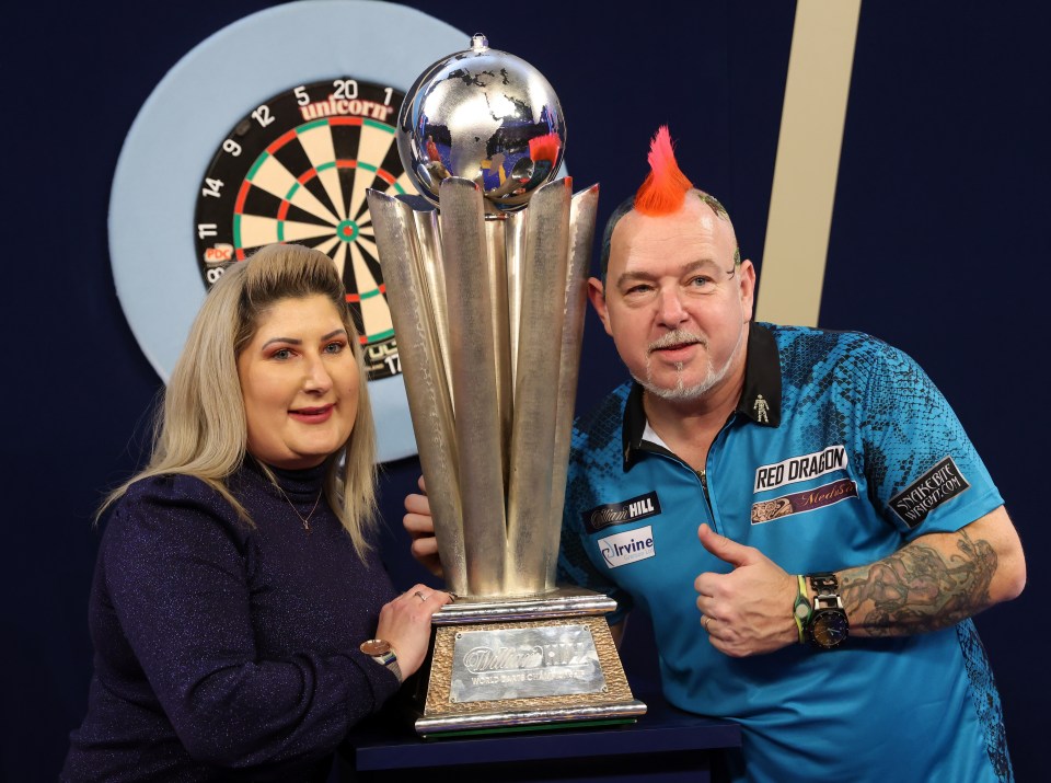 Peter Wright with wife Joanne who looks after his finances