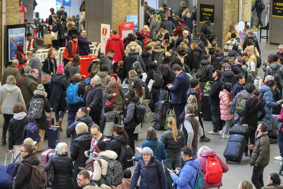 Stranded passengers at King's Cross station yesterday