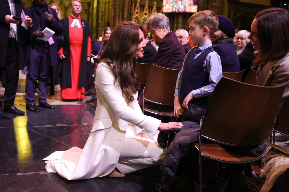 The Princess made the effort to head around and chat to youngsters at a festive service  - including Oscar Burrow