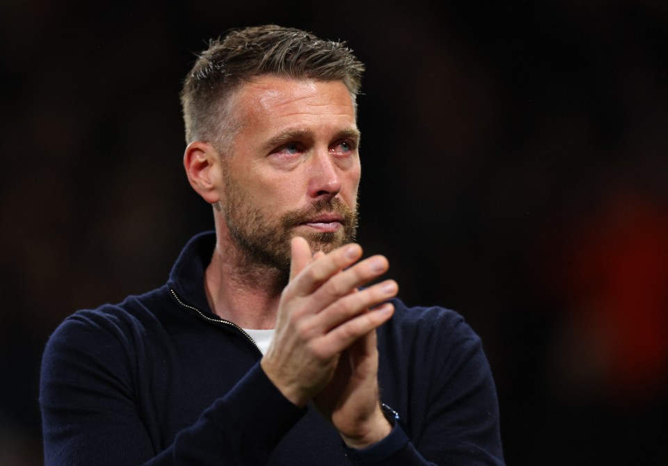 Luton boss Rob Edwards applauded fans after the match was abandoned