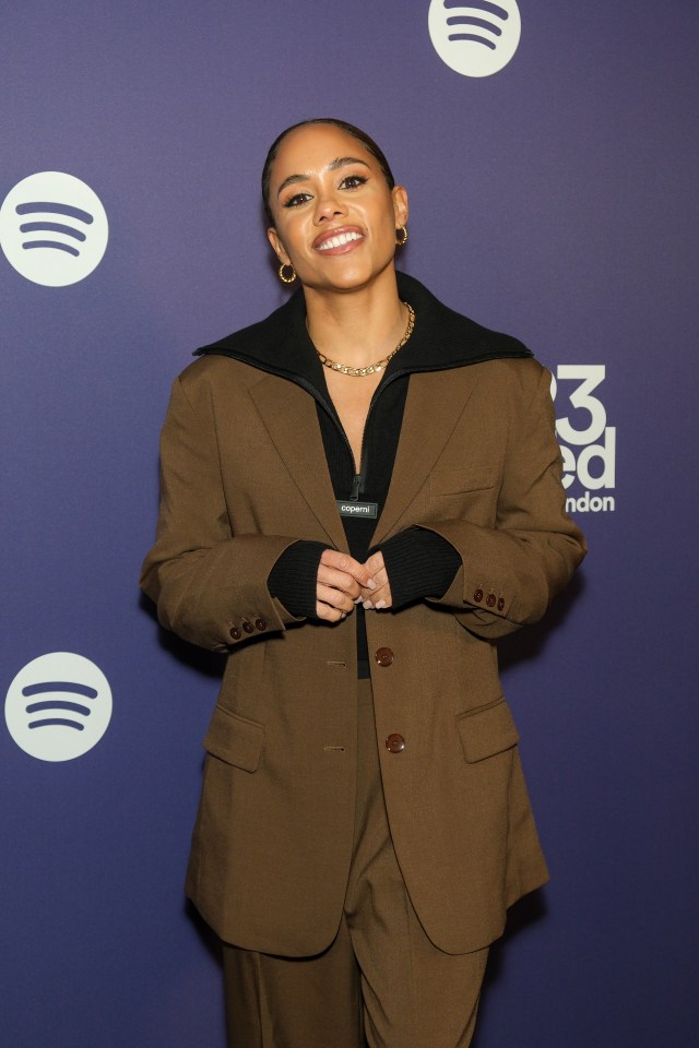 She also stunned in a khaki suit at a recent Spotify event