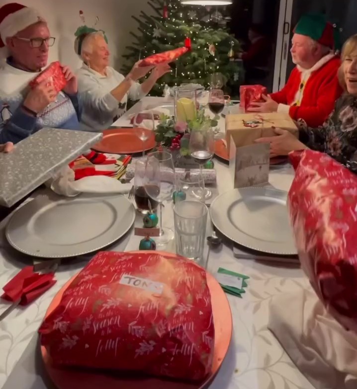 A family showed how they did a charity shop Secret Santa for an early Christmas dinner