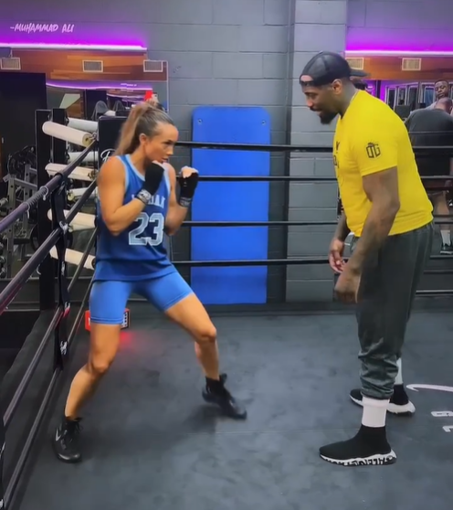 Kate Abdo training with Malik Scott