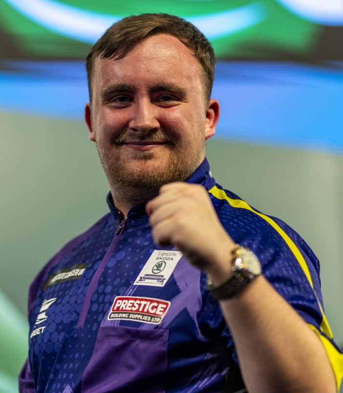 Luke Littler celebrates winning his match against Matt Campbell on day ten of the Paddy Power World Darts Championship at Alexandra Palace, London. Picture date: Wednesday December 27, 2023. PA Photo. See PA story DARTS World. Photo credit should read: Steven Paston/PA Wire. RESTRICTIONS: Use subject to restrictions. Editorial use only, no commercial use without prior consent from rights holder.