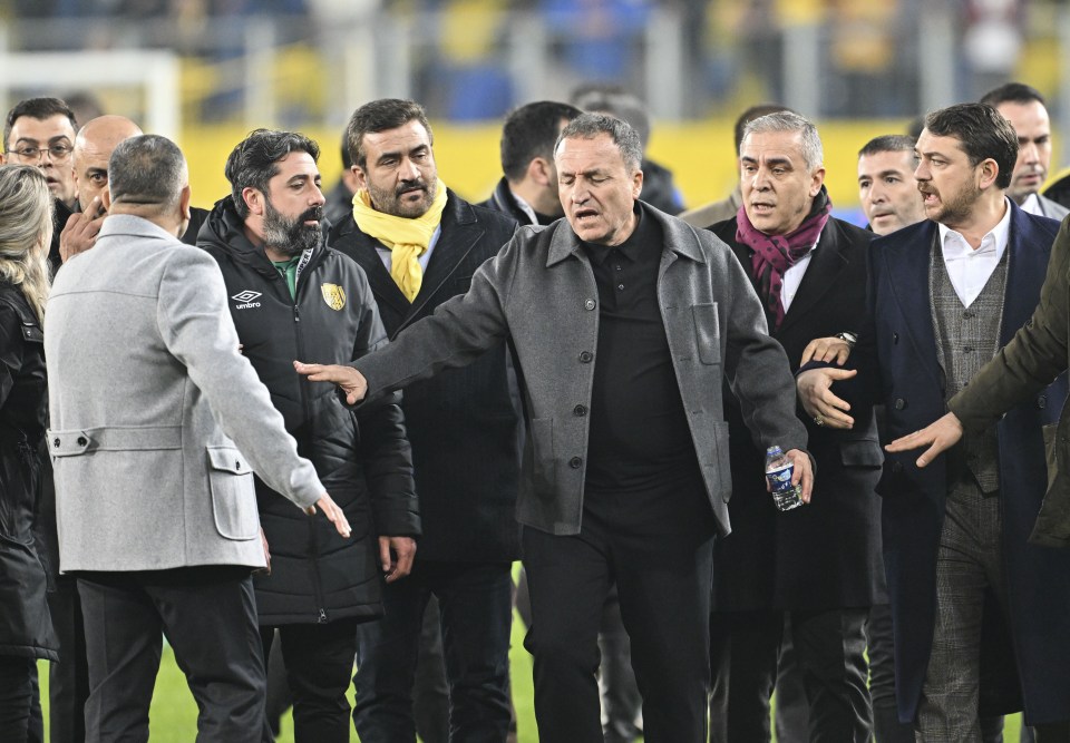 ANKARA, TURKIYE - DECEMBER 11: Faruk Koca (C), President of MKE Ankaragucu throws a punch to the referee Halil Umut Meler (not seen) after the Turkish Super Lig week 15 football match between MKE Ankaragucu and Rizespor at Eryaman Stadium in Ankara, Turkiye on December 11, 2023. The match ended 1-1. (Photo by Emin Sansar/Anadolu via Getty Images)