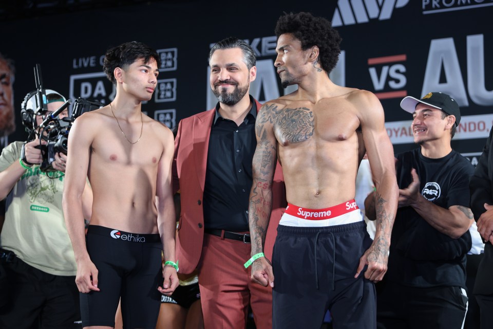 Alexander Gueche (L) and Clayton Ward face off during the Jake Paul vs Andre August Weigh-in