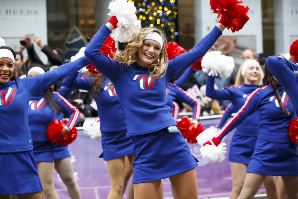 LONDON, UNITED KINGDOM - JANUARY 01: Cheerleaders participating in London New Years Day Parade in London, England on January 1, 2016. The parade is one of the worlds great street spectaculars with up to 10,000 performers attending from around the world and hosts marching bands, cheerleaders, leading companies, unions and local boroughs. (Photo by Tolga Akmen/Anadolu Agency/Getty Images)