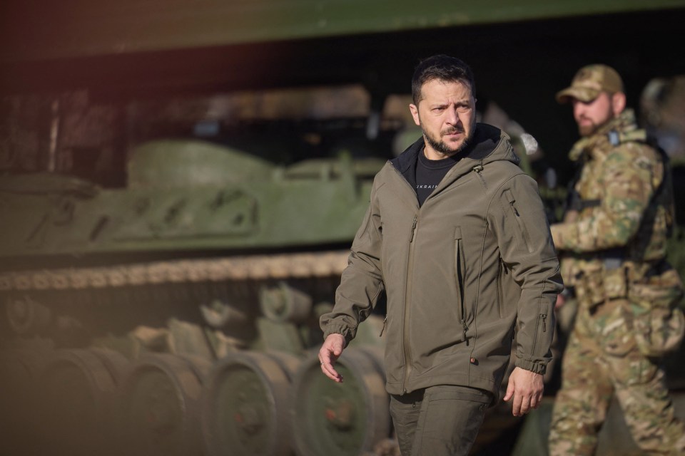 This handout photograph taken and released by Ukrainian Presidential Press Service on November 3, 2023, shows Ukraine's President Volodymyr Zelensky inspecting the latest models of artillery and engineering weaponry during a visit to a training center to mark the "Missile Forces and Artillery and the Engineering Troops" Day at an undisclosed location in Ukraine, amid the Russian invasion. (Photo by Handout / UKRAINIAN PRESIDENTIAL PRESS SERVICE / AFP) / XGTY / XGTY / RESTRICTED TO EDITORIAL USE - MANDATORY CREDIT "AFP PHOTO / Ukrainian Presidential Press Service " - NO MARKETING NO ADVERTISING CAMPAIGNS - DISTRIBUTED AS A SERVICE TO CLIENTS (Photo by HANDOUT/UKRAINIAN PRESIDENTIAL PRESS SER/AFP via Getty Images)