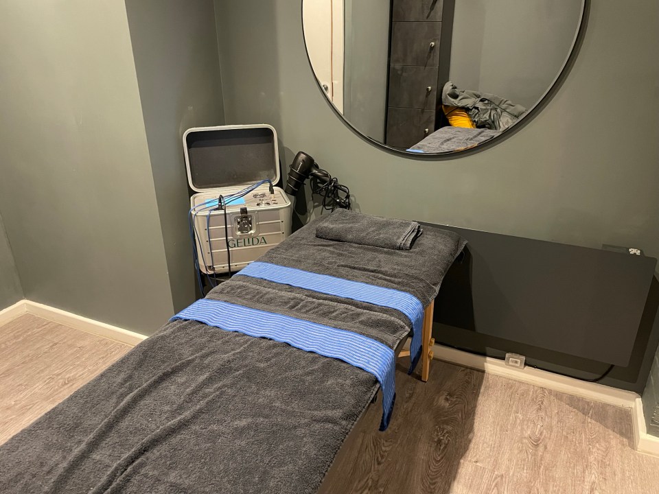 The 'exercise class' involves lying on a massage table