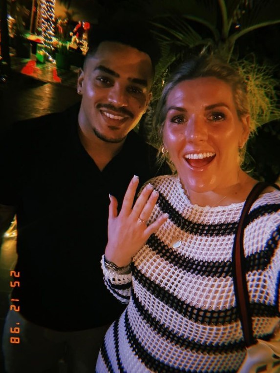 Millie has revealed she and Levi are engaged and showed off her ring to fans