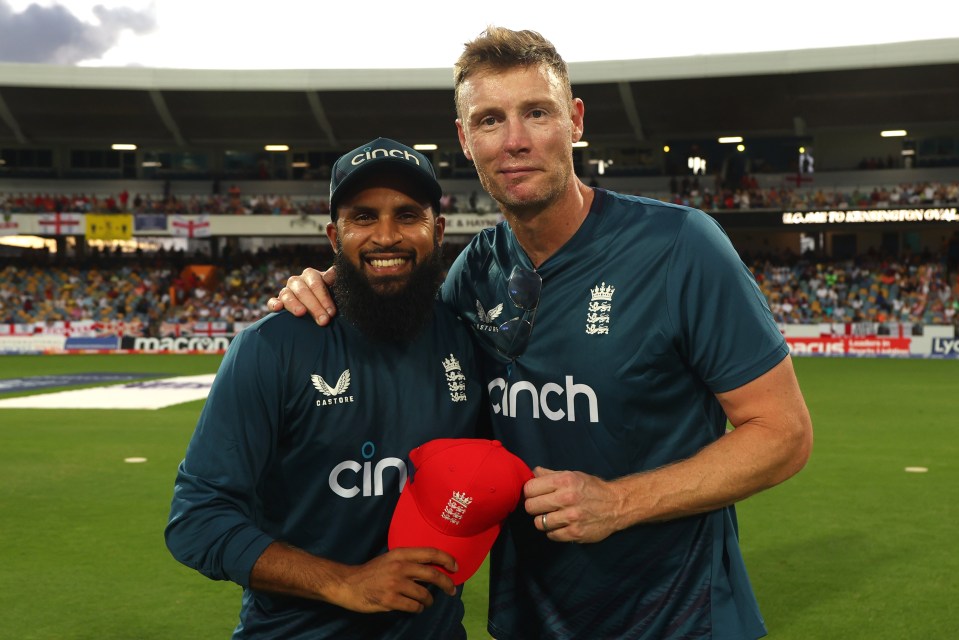 Freddie Flintoff awarding Adil Rashid of England his 100th T20 International cap