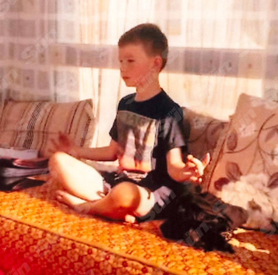 Alex meditates in Morocco aged around seven