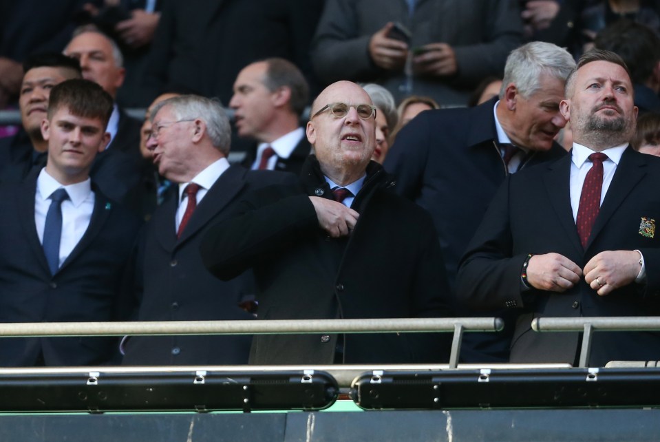 Avram Glazer, centre, is one of the members of the Glazer family that own Man Utd