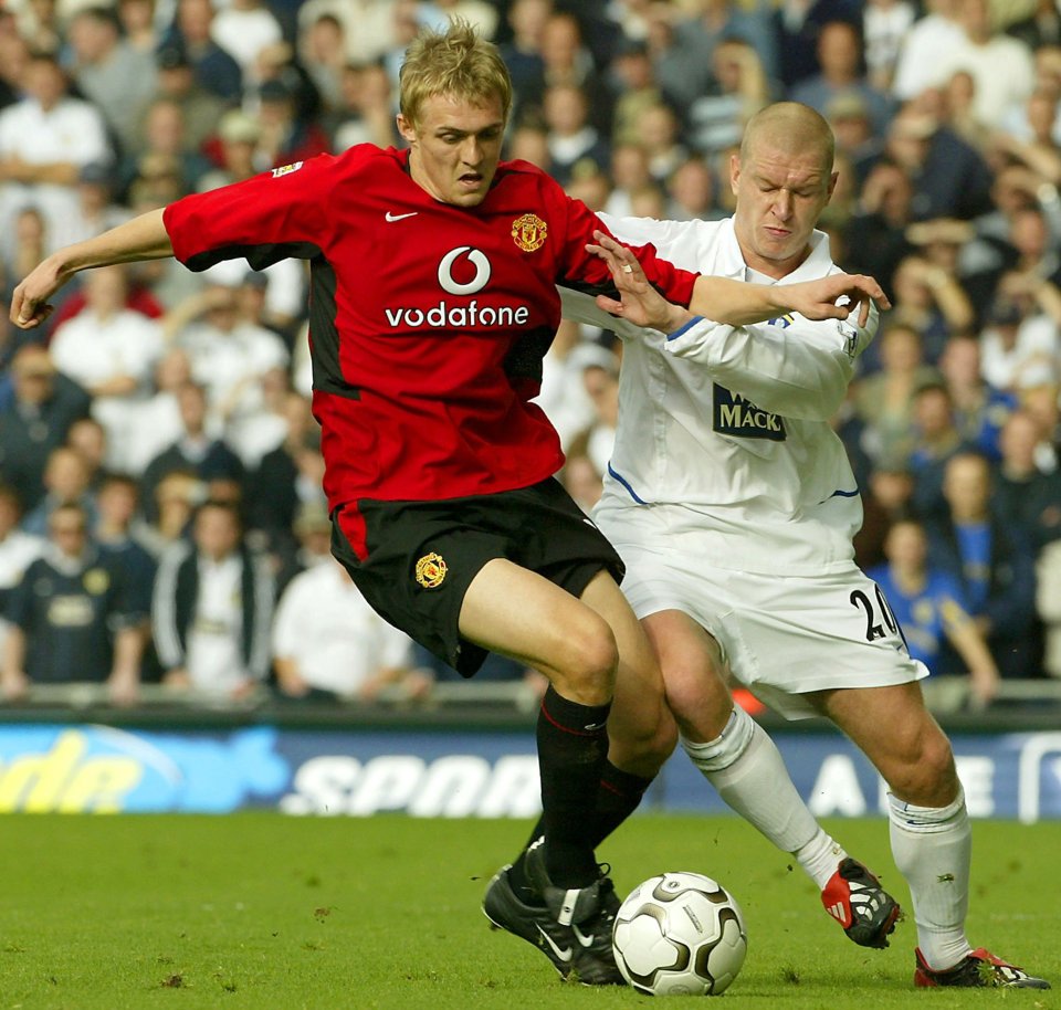 Johnson in action against Manchester United's Darren Fletcher