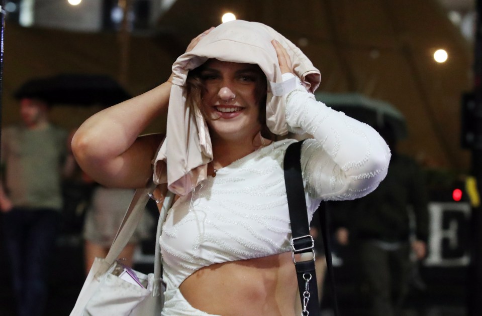 Some girls resorted to using their clothes as shelter against the downpours