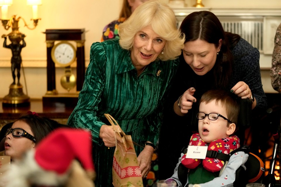 The Queen and kids had bags of fun at the festive bash