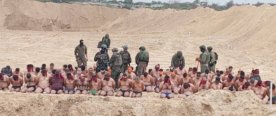 Another picture showed at least 70 men in a different location being blindfolded by Israeli troops