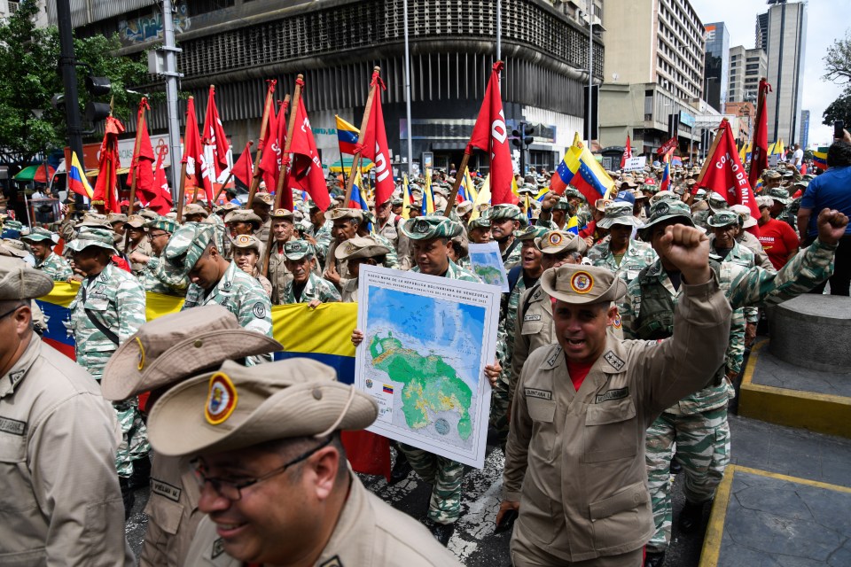 Soldiers stormed through Caracas with the new false map of their country