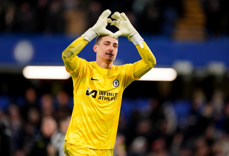 Chelsea goalkeeper Djordje Petrovic celebrates after securing a semi spot