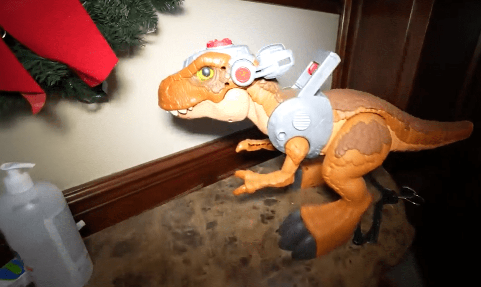 Children's toys were left all over the mansion, including a creepy dinosaur