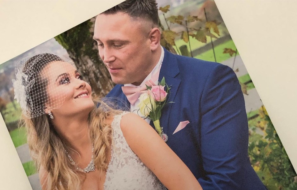 Gerwyn Price and Bethan Palmer on their wedding day with their children.