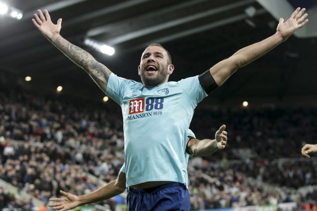 Editorial use only. No merchandising. For Football images FA and Premier League restrictions apply inc. no internet/mobile usage without FAPL license - for details contact Football Dataco Mandatory Credit: Photo by DigitalSouthSHM/REX/Shutterstock (9189120bz) Steve Cook of Bournemouth celebrates after he heads home late to win the game 1-0 Newcastle United v Bournemouth Premier League football match, St James' Park Stadium, Newcastle, UK - 04 Nov 2017