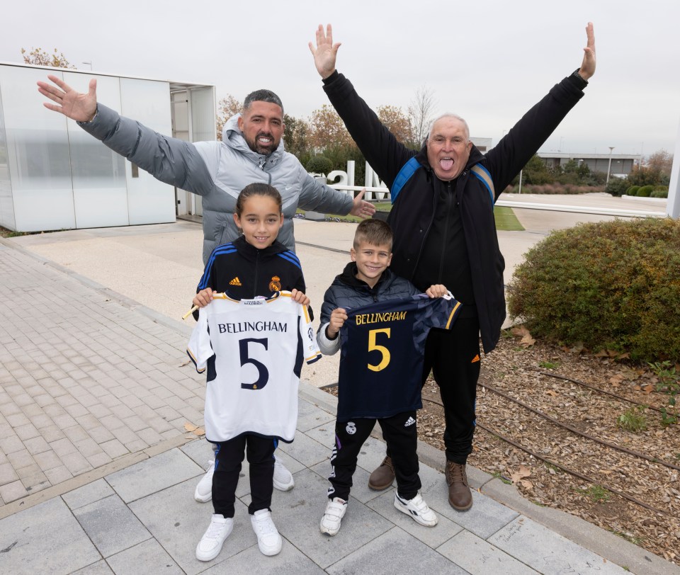 Sun feature -Jude Bellingham in Real Madrid. Fans waiting outside Real Madrid training ground for autographs. .Jose maria luque, 69 and his grandson Pablo marcias 7, From Huelva, spain. Pictured with .Ella vidales 9 from Ibiza and her dad Lucas vidales . Her mother is English