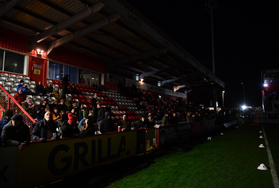 Fans waited in darkness to see if the game would go ahead