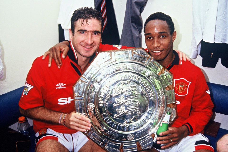 Ince pictured with Eric Cantona (L) after winning the Charity Shield in 1994