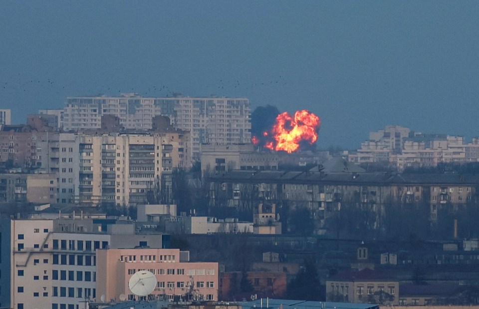 An explosion of a missile is seen during a Russian missile and drone strike in Kyiv