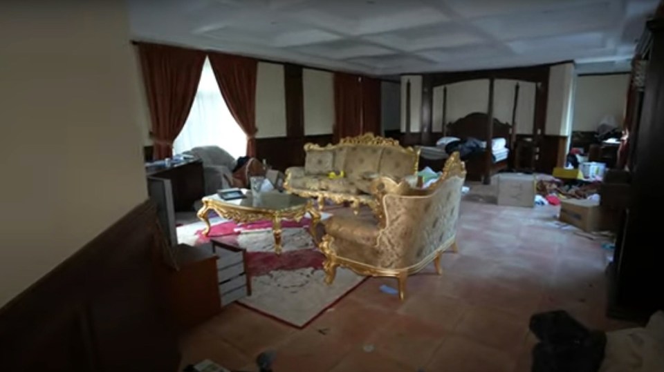 A YouTuber called Noah.Nowhere recently visited the property - and one room had gold furniture