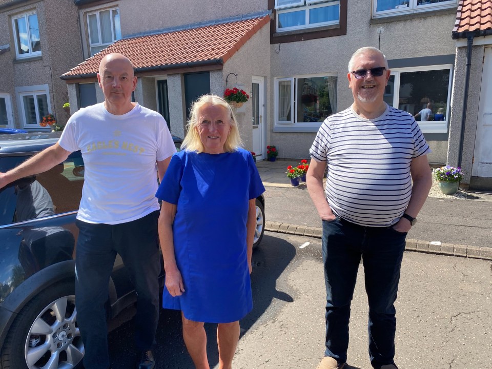 Jimmy and Maureen Stewart, left, along with Ian Dick, say they own the parking spaces outside their homes