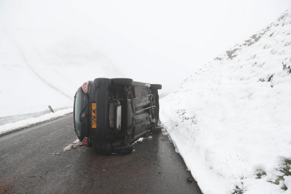 A motor flipped over on the ice in the Peak District yesterday