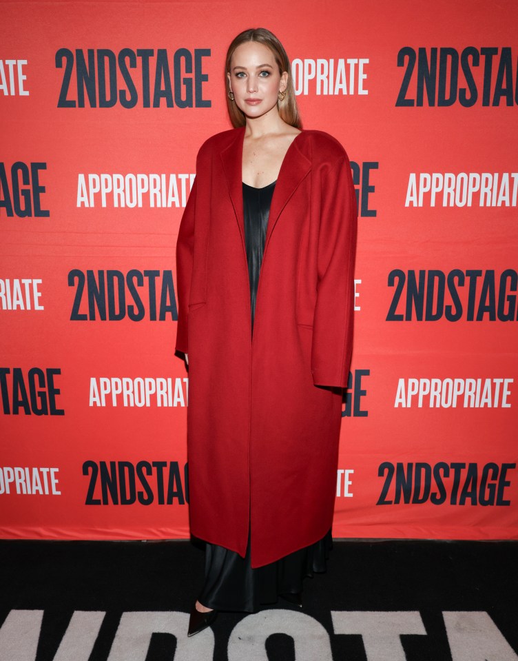 Jennifer Lawrence wore this festive red coat to attend the opening night of the Broadway show Appropriate