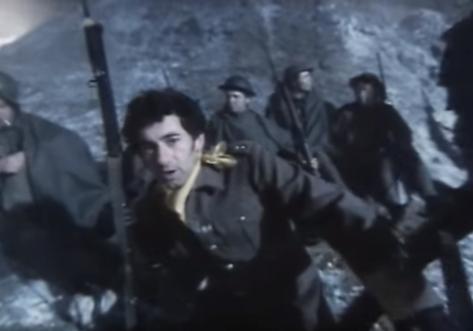 Jona Lewie in a scene from the music video for "Stop the Cavalry."